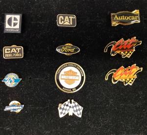 lot 37 image: Collecrtion of Vintage CollarLapel Pins - Harley Davidson, Chevrolet, Ford, AutoCar, Catterpiller, & CAT Motor Sports