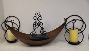lot 72 image: Pair of Black Metal Wall Sconce Candle Lanterns with Electric Pillar Candles - 12in T, Black Metal Book HolderMagazine Rack 11in T, and Large Metal Banana Boat CenterpieceFruit Bowl - 23in L x 9in W x 10.5in T