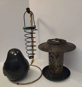 lot 74 image: Metal Hanging BirdSquirrel Feeder with Solar Light - 16in T, Better Homes & Gardens Resin Bird Porch Sitter Figurine 7in T x 8in L, Cast Iron Deck Rail Plant Holder 14in L x 12in D, and Hanging Metal Corn Cob Holder - BirdSquirrel Feeder - 12in L