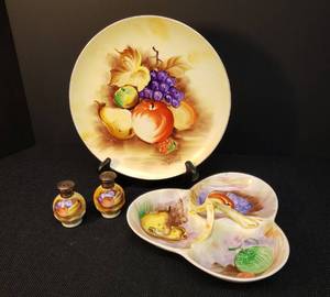 lot 77 image: Vintage 1950s-1960s ENESCO Hand Painted Fruit Design PorcelainCeramic Ware Artist Signed Plate 9in W, Handled Divided Server  8in x 8in, and Set of SaltPepper Shakers with Brass Lids 2.75in T - Original Stickers