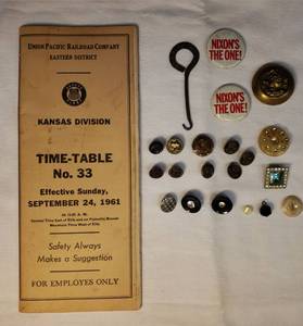 lot 83 image: Vintage Clarks Spats Metal Button Hook Tool, Collection of Vintage Buttons, 1961 Union Pacific Railroad Kansas Division Time-Table BookletMap, and 2 Metal  Nixons the One Campaign Buttons