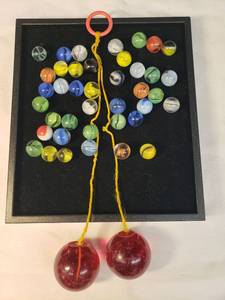 lot 85 image: Vintage 1960s Pink Glitter Acrylic CLACKERS with Yellow Cord - and 40 Vintage Glass Cat Eye Marbles - Various Colors