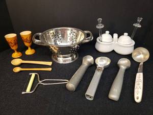 lot 94 image: Vintage Carved & Etched Wood Mini Chalice Stems, SS Colander, Wood Measuring Spoons Made in Portugal, Houston Harvest Crockery JellyHoney Server with Lids & Acrylic Wands, and Vintage Ice Cream Scoops, Ladle, & Cheese Slicer