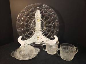 lot 99 image: Vintage Sandwich Glass Domed Butter Dish 7.5in W x 4in T, and Matching Cream & Sugar, and Indiana Glass Consellation Patten Torte Plate 13in W