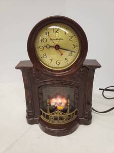 lot 140 image: Vintage 1940s-50s Master Crafters Electric Fireplace Clock Model #272 - Fire Roller, Light, & Clock ALL WORK - Beautiful Molded Wood Grain Bakelite Case - Original Sticker on Back - Made in USAChicago - 7.5in W x 10.5in T x 3.5in D