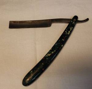 lot 161 image: Vintage The Mars Engraved Blade Folding Straight Razor with SpeckleMarbled Bakelite Handle - Stamped Made in Germany - U.S. Distributor G.R. Springer Kansas City, MO -Circa 1920s-1950s - 9.75in L Full Open