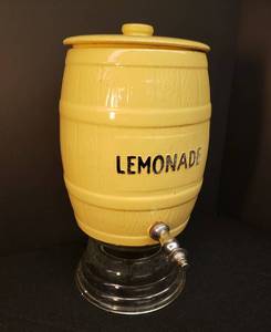 lot 165 image: Vintage Watt Stoneware LEMONADE Dispenser Barrel with Lid & Stainless Steel Spigot - 12in T - on 1930s McKee Beehive #9 Heavy Clear Glass Drink Dispenser Riser 8.5in W x 5.75in T