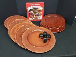 lot 33 image: Vintage 1991 Betty Crockers 40th Anniversary Edition Cookbook - Appears Unused, Wood Napkin Rings,  and 11 Gibson Plastic Charger Plates - 4 Embossed Leather Style & 7 Rustic Metal Style