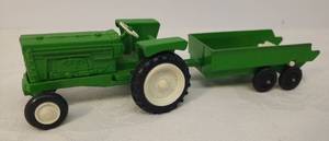 lot 58 image: Vintage 1970 TOOTSIE TOY Chicago - Green Die-Cast Metal Tractor 3.25in L x 2in W and Manure Spreader Trailer 3.5in L x 1.5in W - Both Bottom Stamped