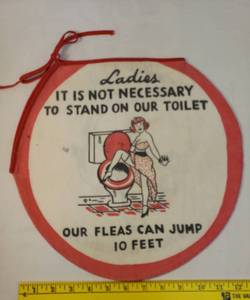lot 79 image: Vintage 1950s Humerous Novelty ToiletCommode Seat Cover - Printed Cotton Cloth with Ties - On Top Ladies It Is Not Necessary...., On Back Sitting On Your...... - 13in L x 13.5in W
