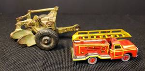 lot 89 image: Antique Arcade Cast Iron 2-Bottom Plow #423, Original Rubber Tires Stamped Arcade Balloon - 4.5in L x 3in W, and Vintage Pressed Tin Lithograph Firetruck with Moving Ladder 3.25in L x 1 18in W