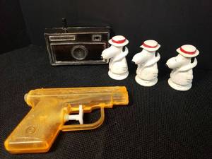 lot 96 image: Set of 3 Vintage 1965 Joe Cool Snoopy College Football Fan Pincil TopperEraser Figurines - by United Feature - Bottoms Stamped USA - 2.25in T, and Vintage Plastic Water Squirters 250 Repeater Pistol & 35mm Camera