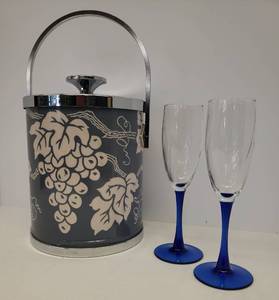 lot 158 image: Vintage 1970s Serv-Master Creations - Chrome with Grape Vine Design, Handle & Lid - Liner is Removable - 14in T x 8in W, and Set of 2 Luminarc France Cobalt Blue Stem Champagne Flutes - 8.25in T