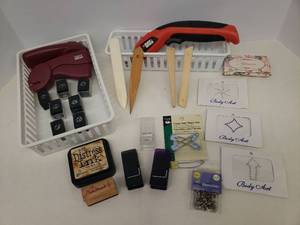 lot 162 image: 2 Marvy Uchida Paper Punches & 7 Interchangeable Design Cutters, Handmade By Stamp, Distress Ink, Project Clips, Crafting Supplies, Black & Decker Electric Scissors, and Body Art Stickers - in Storage Trays