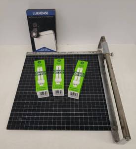 lot 174 image: Vintage NIKOR 12in Safety Trimmer, LUXHD450 High Performance Lenses for you Mobile Device - 5-in-One Universal Clip Lens in Original Box, and 3 GE Biax D ECO 13W 4 Pin Compact Fluorescent BullbLamps in Original Boxes