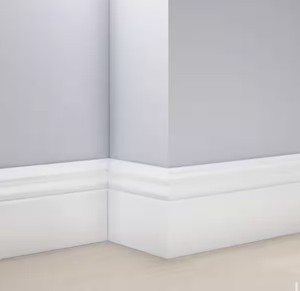 lot 136 image: 5-14 in. x 58 in. x 96 in. Baseboard White Prepainted Waterproof Colonial PVC Moulding (1-Piece) Retails $47