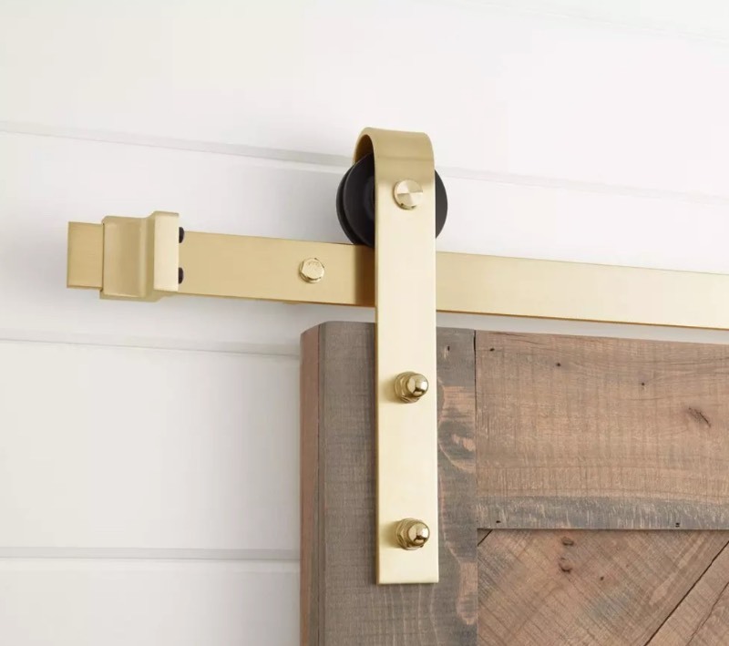 lot 37 image: Hal 78 in. Barn Door Bent Strap in Champagne Brass Retails $279