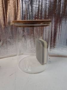 lot 37602 image: Glass Storage Container Airtight Food Jars Kitchen Canister with Wood Lids, 94 Oz Wide Mouth Pantry Organization Glass Jar for Flour, Sugar, Cookie, Spagetti, Nuts and Candy - Retail $19