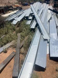 lot 261 image: Steel beams and metal building materials