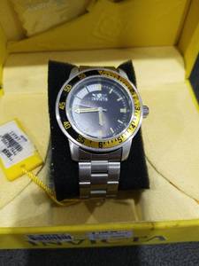 lot 3893 image: Invicta Mens Stainless Steel Watch with Yellow Rotating Bezel (Will Need a Battery)