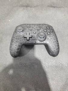 lot 3904 image: Nintendo Switch Pro Controller Cracked Pattern Design