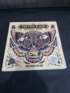 lot 3977 image: The Tattoo Flash Coloring Book by Megamunden