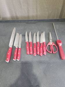 lot 3994 image: Farberware Red Handle Kitchen Knife Set with Scissors and Sharpening Steel