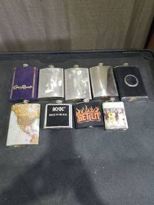 lot 4943 image: Hip Flask Collection with Crown Royal, ACDC, World Map and Novelty Designs