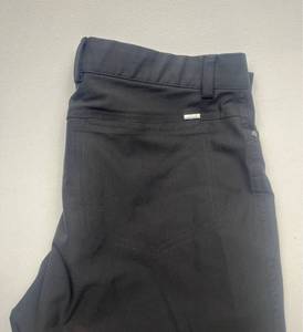 lot 123 image: Greg Norman Mens Black Performance Golf Pants Size 32x32