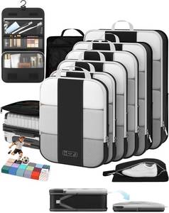 lot 6157 image: 10 Set Compression Packing Cubes for Travel Essentials,Compressible Expandable Packing Cubes for Suitcase,OlarHike Luggage Garment Bags for Travel,Handy Helper for Organizing Clothes(Black)