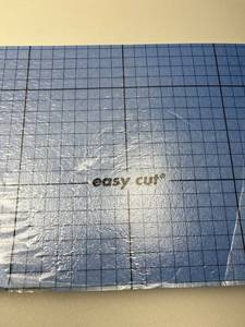 lot 106 image: Easy Cut Self-Healing Cutting Mats with Grid Lines