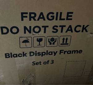 lot 116 image: Black Display Frame Set of 3