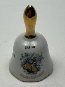 lot 133 image: 50th Anniversary Commemorative Porcelain Bell with Gold Handle
