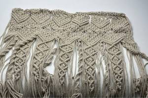 lot 154 image: Handwoven Macrame Wall Hanging with Fringe Detail