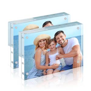 lot 23880 image: HOUSE DAY Acrylic Picture Frames 5x7, 2 Pack Magnetic 5x7 Picture Frame, Double Sided Clear 5 x 7 Photo Frame with Microfiber Cloth, Frameless FreeStanding 5x7 Frame Gift for Desktop Display - Retail $26