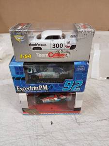 lot 42662 image: NASCAR Diecast Car Collection - Team Caliber and Racing Champions Set of 3 - Retail $25