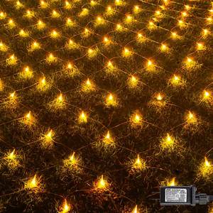 lot 27826 image: FUNPENY Christmas 360 LED Net Lights, 12 FT x 5FT Clear Wire Christams Outdoor String Lights 8 Modes Waterproof Connectable Xmas Decorations for Indoor Bushes Garden Party Holiday Decor (Warm White) - Retail $23