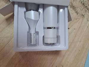 lot 4033 image: Electric Facial Hair Remover with Derma Roller