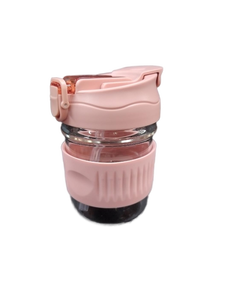 lot 6214 image: Glass Travel Coffee Cup with Pink Silicone Sleeve and Locking Lid 350ml