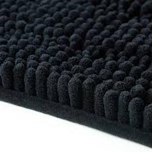 lot 2116 image: Mainstays brand Black fuzzy bath mat approximately one and a half by 2 ft