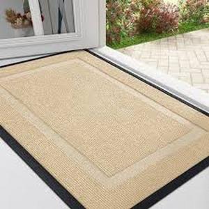 lot 2124 image: Brown doormat approximately 1 ft by 2 ft