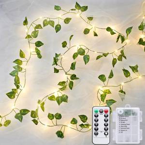 lot 2269 image: JMEXSUSS 33Ft Vines with Lights Battery Operated, 100 LED Pothos Leaf Vine Lights for Bedroom Wall Room Party Wedding Decoration (Warm White)