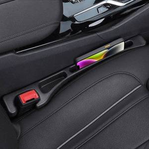 lot 20305 image: FOLUMAD Car Seat Gap Filler, 2 Pack No-Drop Seat Side Gap Seam Filler Organizer with Phone Holder, Universal Fit Fill The Gap Between Seat and Console, Perfect for Car SUV Truck Black