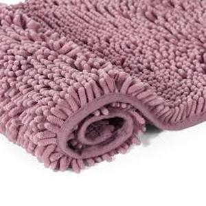 lot 1706 image: Purple oversized fuzzy bath mat approximately 4 ft by 2 ft