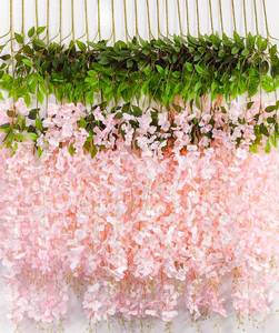 lot 6373 image: Wisteria Hanging Flowers 12 Pack Artificial Flowers Fake Wisteria Vine Rattan Hanging Garland Silk Flowers String for Party Home Wall Greenery Wedding Decor (Light Pink)