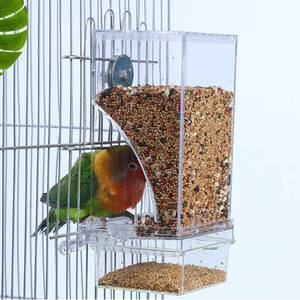 lot 2150 image: Hamiledyi No Mess Bird Cage Feeder Automatic Parrot Seed Feeders with Perch Acrylic Transparent Seed Food Container Cage Accessories for Small and Medium Parakeets Lovebirds