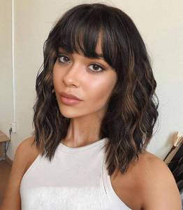 lot 4243 image: Veally Short Wavy Bob Wigs with Bangs for Women Black Mixed Brown Short Wavy Bob Curly Wig Synthetic Heat Resistant Bob Wig