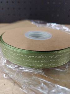 lot 14180 image: Green Sentiment Ribbon Spool with Kraft Paper Bags Set