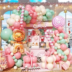lot 2078 image: Christmas Balloon Arch Kit, Pink Green Ivory White Balloons with Gingerbread Man Candy Lollipop Foil Balloons for Christmas Party Decorations New Year Party Supplies