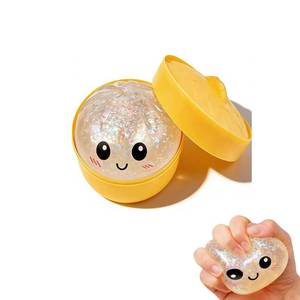 lot 12451 image: Dumpling, Dumpling Squishy with Box, Cute Anxiety Relief Fidget Toy, Soft Squeeze Decompression Dough for Adults (Flashing White with Eyes) (Used)